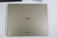RAPIDE: A collection of Aston Martin Rapide sales brochures. - 2