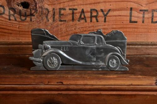 LETTER RACK: A high quality heavy circa 2000 metal letter racking with 1930s car, 15.5cm wide