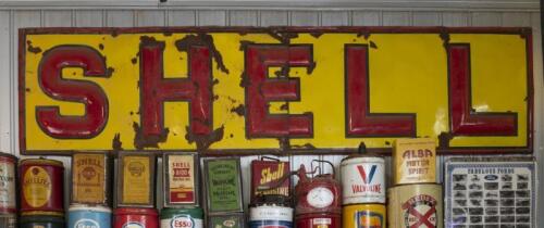 SHELL: A large early two part enamelled "Shell" sign, with embossed letters and border, 88 x 350cm