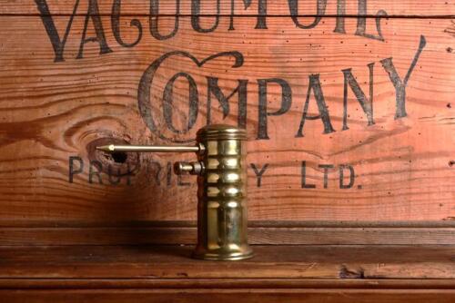 OILER: A brass cylindrical "Eagle"oil gun, 12.5cm high