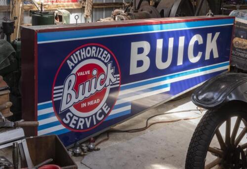 BUICK: A large reproduction Buick illuminated hanging sign in an original period frame, 110 x 300cm