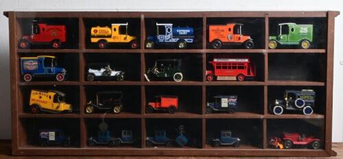 VETERAN/VINTAGE: A collection of over twenty model cars, some in wall mounted boxes, various makers including Matchbox, Tomica
