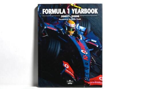 FORMULA 1: A 'FORMULA 1 YEARBOOK 2007-2008'. Yearbook with numerous signatures including Gerhard Berger, David Coulthard, Ron Dennis, Kimi Raikkonen, Stefano Domenicali