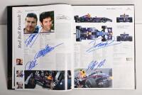 FORMULA 1: A 'FORMULA 1 YEARBOOK 2007-2008'. Yearbook with numerous signatures including Gerhard Berger, David Coulthard, Ron Dennis, Kimi Raikkonen, Stefano Domenicali - 4