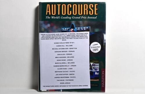 AUTOCOURSE: A 'AUTOCOURSE - THE WORLD'S LEADING GRAND PRIX ANNUAL (1995-96)'. Annual with applied 1995 Monaco Grand Prix qualifying sheet signed by numerous Formula 1 drivers and associated personnel including Jean Alesi, Michael Schumacher, Rubens Barri