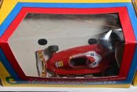 FORMULA 1: A group of 1:43 YAXON Formula 1 related models and boxes. Two Ferrari T4's (art. 0700) & Ligier JS11 (art 0711) models - 3