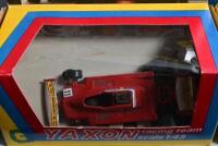 FORMULA 1: A group of 1:43 YAXON Formula 1 related models and boxes. Two Ferrari T4's (art. 0700) & Ligier JS11 (art 0711) models - 4