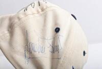 STEWART FORD: Two 'Ford STEWART GRAND PRIX' caps. One cap signed by Jackie Stewart, Sir Jack Brabham, Glen Ridge, George Harrison. Interesting item - 2