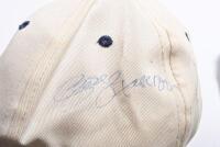 STEWART FORD: Two 'Ford STEWART GRAND PRIX' caps. One cap signed by Jackie Stewart, Sir Jack Brabham, Glen Ridge, George Harrison. Interesting item - 5