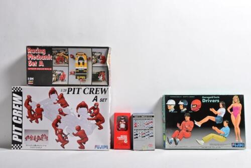 MODEL CREW SETS: A group of model scale crew and diorama sets. Michael Schumacher figurine by Paul's Model Art