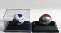 MODEL HELMETS: Two helmets by Paul's Model Art/MINICHAMPS in 1:8 scale. 'ALAIN PROST 1989' Formula 1 helmet & 'MARIO ANDRETTI 1995' IndyCar helmet - 2