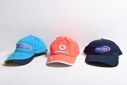 F1 CAPS: Three Formula 1 caps. Signed, 'MILD SEVEN' cap
