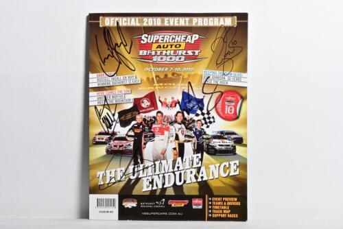V8 SUPERCARS: An October 2010 'SUPERCHEAP AUTO BATHURST 1000' Official Program. Front cover signed by Garth Tander, Will Davison, Ryan Briscoe, Fabian Coulthard, Craig Baird