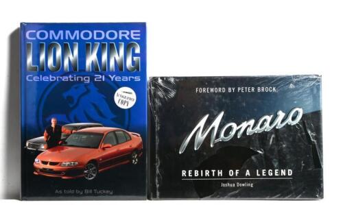 HOLDEN: Two Holden related publications. 'COMMODORE LION KING - Celebrating 21 Years' hardcover book by Bill Tuckey. Peter Brock, Cameron McConville, Tomas Mezera, Garth Tander, Jason Bargwanna signatures