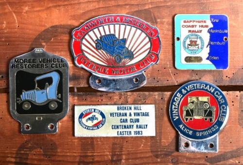 CAR BADGES: A collection of car club badges. 'TAMWORTH & DISTRICTS, ANTIQUE MOTOR CLUB', 'VINTAGE & VETERAN CAR CLUB, ALICE SPRINGS', 'MOREE VEHICLES RESTORERS CLUB', 'SAPPHIRE COAST HUB RALLY for Sapphire Coast Historic Vehicle Club, 'BROKEN HILL VETERAN