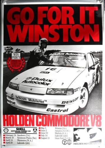 COMMODORE V8 (WIN PERCY): A large Holden Motor Sport poster depicting Win Percy with a Holden Commodore V8. Circa 1990's (127cm high x 90.5cm wide)
