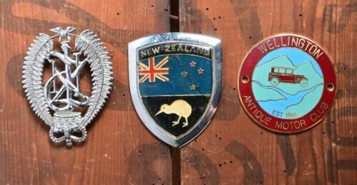 NEW ZEALAND BADGES: Three New Zealand related badges. 'WELLINGTON ANTIQUE MOTOR CLUB' brass badge & New Zealand Police badge