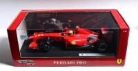 FERRARI: A 1:18 scale Hotwheels Racing Ferrari F60 Formula 1 model as raced by Felipe Massa. Box never opened