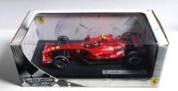 FERRARI: A 1:18 scale Hotwheels Racing Ferrari F2007 Formula 1 model as raced by Kimi Raikkonen. 'Rosso Corsa'. Display box sealed