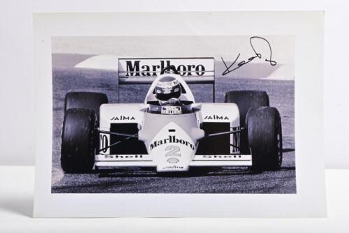 K.ROSBERG: A superb black and white picture of Keke Rosberg racing the McLaren MP4/2C during the 1986 Formula 1 season. Keke Rosberg signature