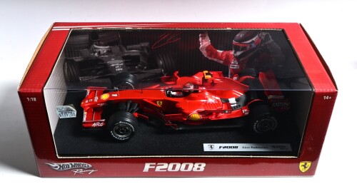 FERRARI: A 1:18 scale Hotwheels Racing Ferrari F2008 Formula 1 model as raced by Kimi Raikkonen, model in 'Rosso Corsa'. Display box sealed