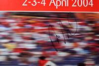 BAHRAIN: A 'Gulf Air Bahrain Grand Prix 2 - 4 April, 2004' promotional poster with image of Michael Schumacher racing a Ferrari F2004. Poster signed by Ross Brawn - 2