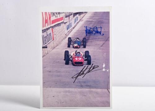 STEWART/SURTEES: A colour picture depicting Jackie Stewart and John Surtees at the 1966 Monaco Grand Prix. Stewart & Surtees signatures