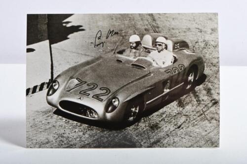 MOSS: A black and white picture from the Daimler-Benz Archive depicting Stirling Moss and Denis Jenkinson racing a Mercedes-Benz 300 SLR at the 1955 Mille Miglia. Stirling Moss signature