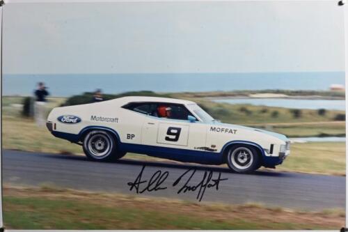 MOFFAT: A colour picture of Allan Moffat racing a XC Ford Falcon "Cobra". Picture signed by Allan Moffat