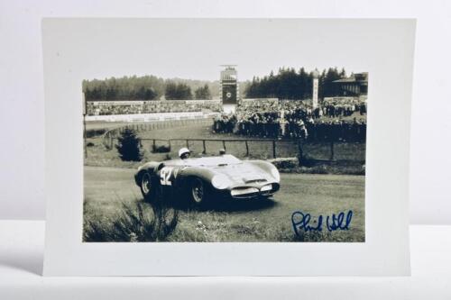 HILL: A black and white image of Phil Hill racing a Ferrari 246 SP at 1962 Nurburgring 1000 KM. Phil Hill signature