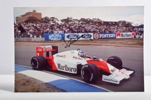 ROSBERG: A colour picture of Keke Rosberg racing the McLaren F1-MP4/2C at the Australian Grand Prix, Adelaide. Rosberg signature