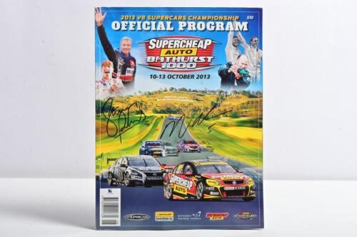 BATHURST: A '2013 V8 SUPERCARS CHAMPIONSHIP OFFICIAL PROGRAM' for the 'SUPERCHEAP AUTO BATHURST 1000' October 10-13, 2013. Front cover signed by race winners Steven Richards and Mark Winterbottom