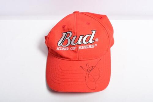 BOWE: A 'Bud KING OF BEERS' red cap. Visor signed by John Bowe