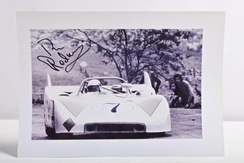 REDMAN: A black and white picture of Brian Redman racing a VW-Gulf Porsche 908/3 at the 1974 Targa Florio. Brian Redman signature