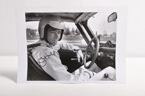 HALL: A black and white image on paper of Jim Hall in the driver's seat of the Lime Rock Schaefer Trans-Am 1970. Jim Hall signature