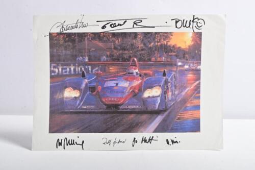 AUDI LE MANS: A paper print copy of Nicholas Watt's - "Audi at Le Mans" - depicts the 2002 race with Emanuele Pirro negotiating the first chicane at dusk. Print copy signed by Frank Biela, Ralf Juttner, Dr Wolfgang Ullrich, Tom Kristensen, Reinhold Joest,