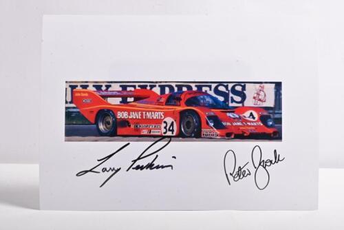 BROCK/PERKINS: A colour image of Bob Jane T-Marts Porsche 956 as raced by Peter Brock and Larry Perkins. Brock & Perkins signatures