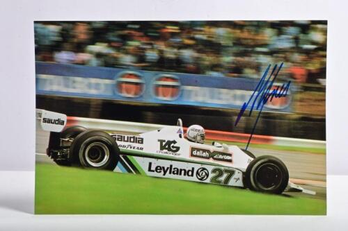 JONES: A colour picture of Alan Jones racing the Williams FW07B at the 1980 British Grand Prix. Alan Jones signature