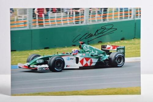 WEBBER: A colour picture of Mark Webber driving a Jaguar R5 at the Australian Grand Prix, Melbourne. Mark Webber signature