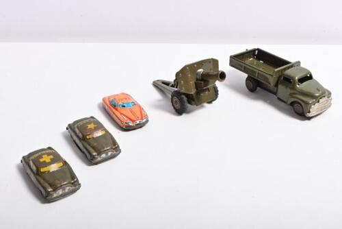 JAPANESE TIN: A collection of five Japanese tin toys. Small cars & military truck with cannon