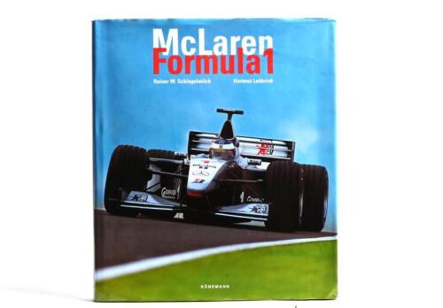 McLAREN: 'McLaren Formula 1' hardcover book by Rainer W.Schlegelmilch and Hartmut Lehbrink. Title page signed by Gerhard Berger and David Coulthard