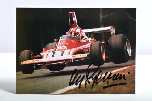 REGAZZONI: A colour picture of Clay Regazzoni racing to victory in a Ferrari 312 B3 at Nurburgring, 1974. Picture with Clay Regazzoni signature