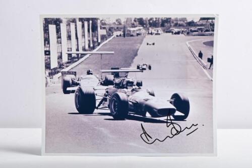 BELL: A superb black and white picture of Derek Bell racing a Ferrari 246T for the Scuderia Veloce team at Sandown 1969. Picture signed by Derek Bell