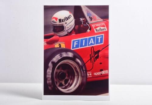 ARNOUX: A driver cockpit colour picture of Rene Arnoux racing a Ferrari 126 C4 F1. Rene Arnoux signature