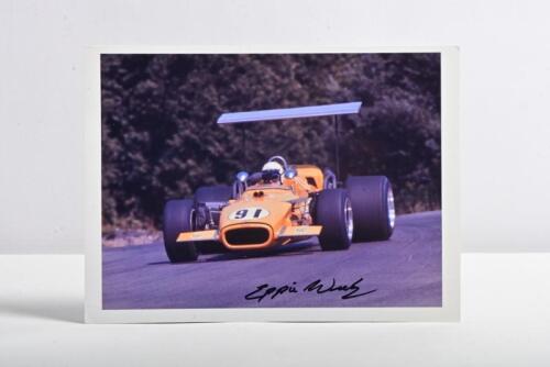 WIETZES: A colour image of Eppie Wietzes racing a Lola T142 at Mosport, Canada 1969. Picture signed by Eppie Wietzes