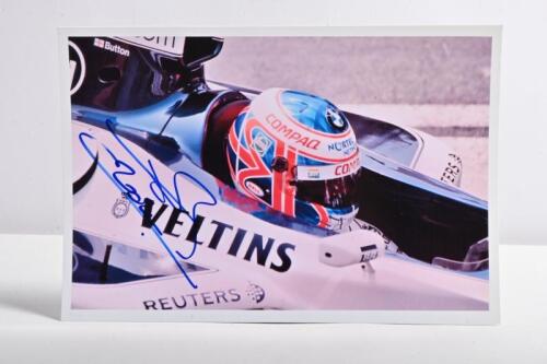 BUTTON: A colour cockpit picture of Jenson Button in a Williams BMW F1 car. Picture signed by Jenson Button
