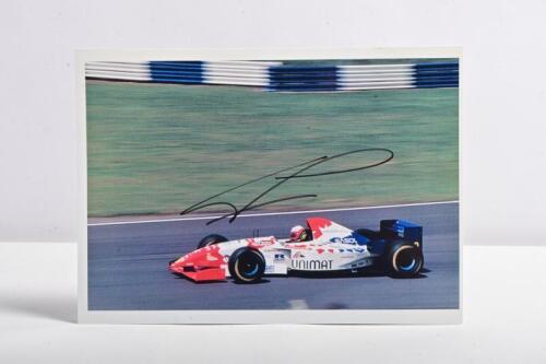 PAPIS: A colour picture of Max Papis in an Arrows. Max Papis signature