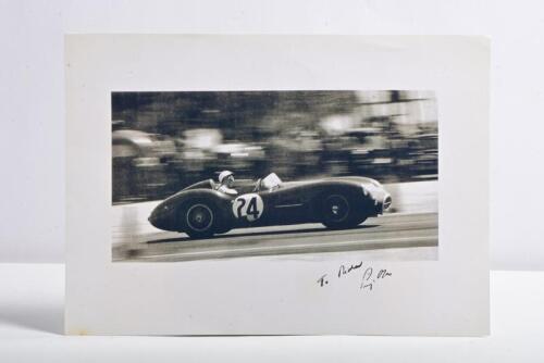 MOSS: A grainy black and white picture of Stirling Moss racing an Aston Martin DBR1 at Sebring 1958. Stirling Moss signature