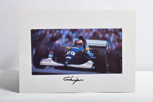WENDLINGER: A colour picture of Karl Wendlinger racing a Sauber during the Canadian Grand Prix, Montreal 1993. Karl Wendlinger signature
