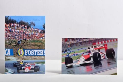 PROST: Two colour pictures of Alain Prost racing a Marlboro McLaren at Spa (1986) and San Marino (1989). Alain Prost signatures